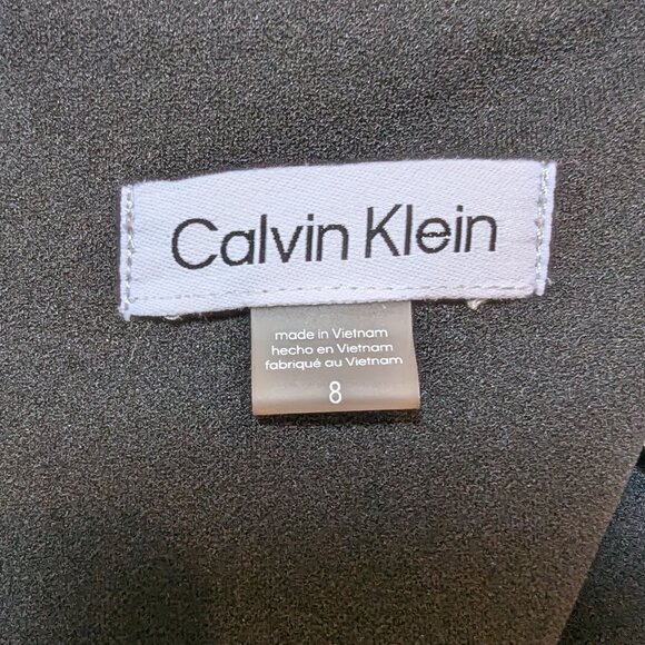 Calvin Klein | NWOT Size 8 Dress Black Flutter Skirt Short Sleeve Office Work - Picture 7 of 9
